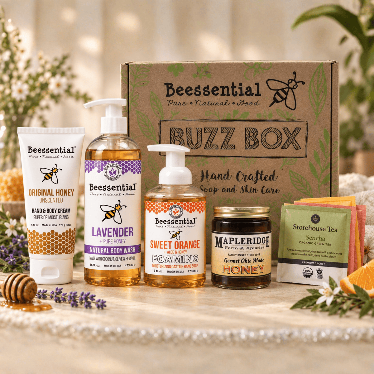 Queen Bee Bliss Gift Set by Beessential with body wash, foaming hand soap, hand and body cream, local honey and tea bags in gift-ready packaging
